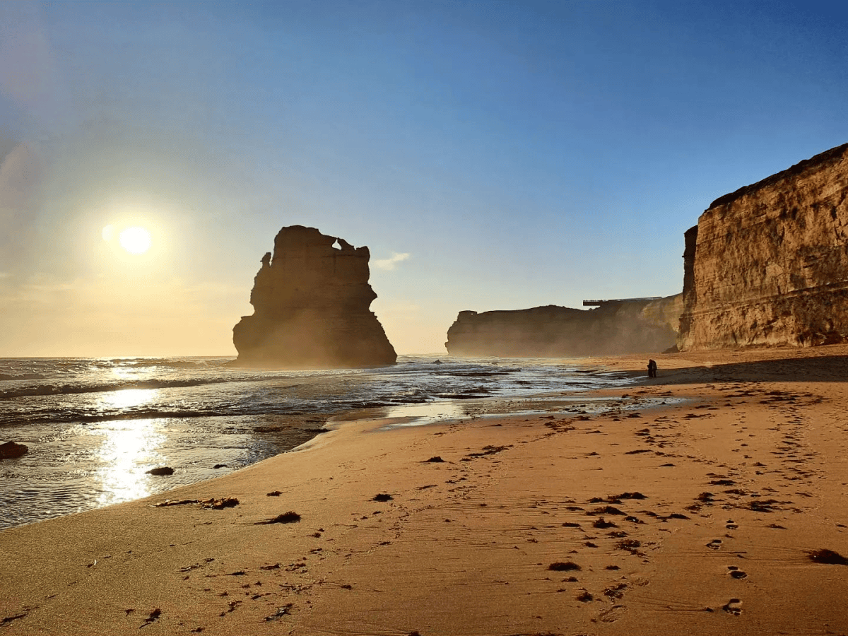 Sun setting behind a limestone stack at Gibson Steps beach
