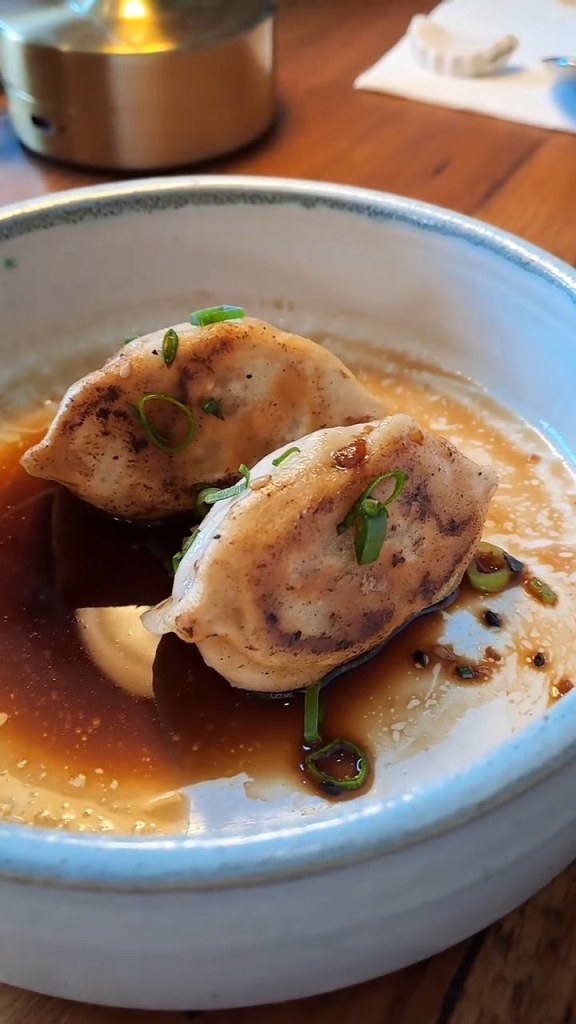 Dumplings in a glossy sauce
