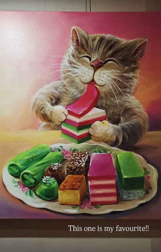 A painting of a happy cat eating colourful kueh