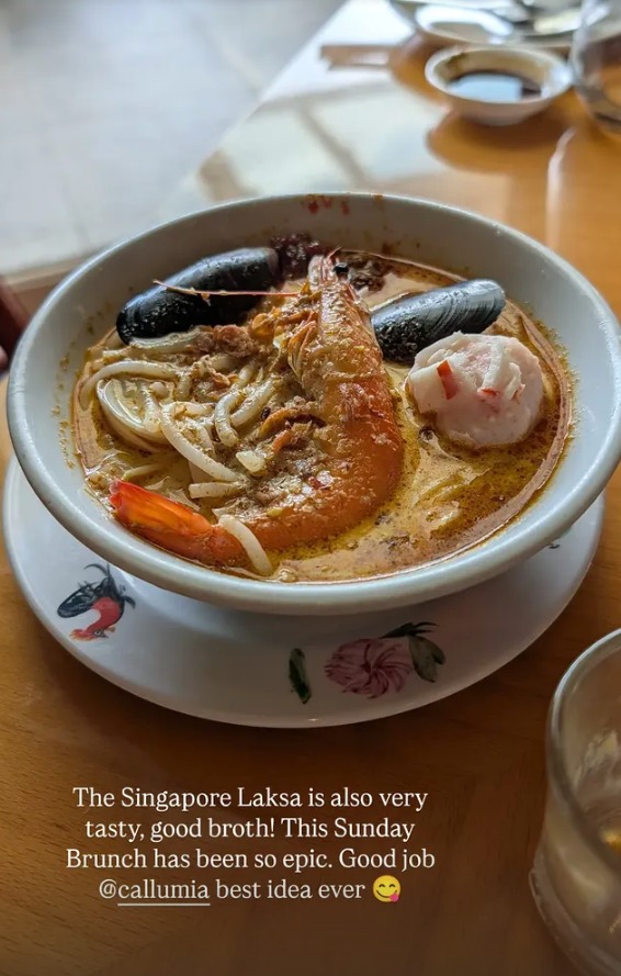 A bowl of Singapore laksa with prawn and mussels
