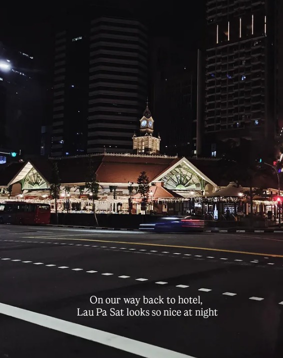 Lau Pa Sat lit up at night with its clock tower