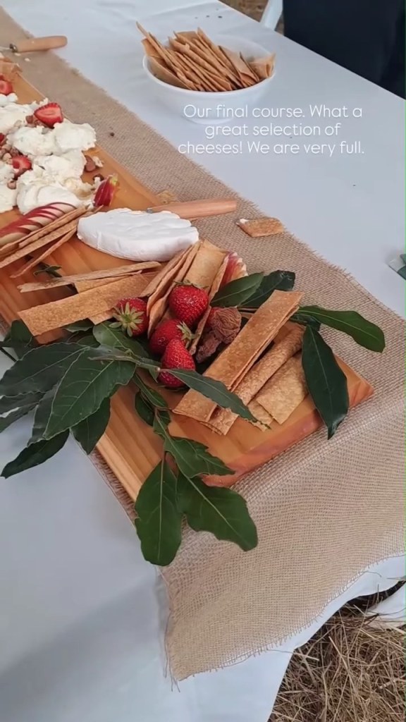 Final course of cheeses, crackers and strawberries