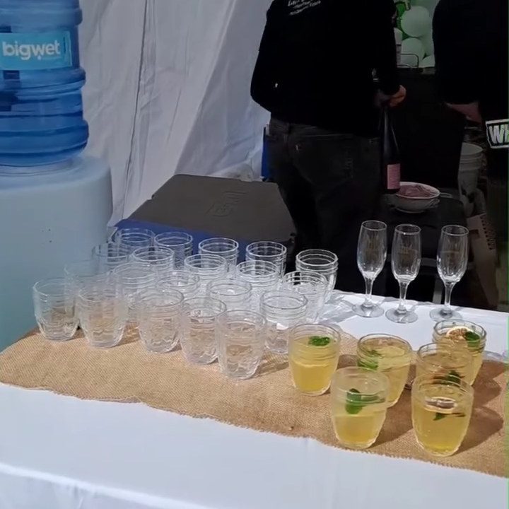 Welcome drinks set out in the marquee