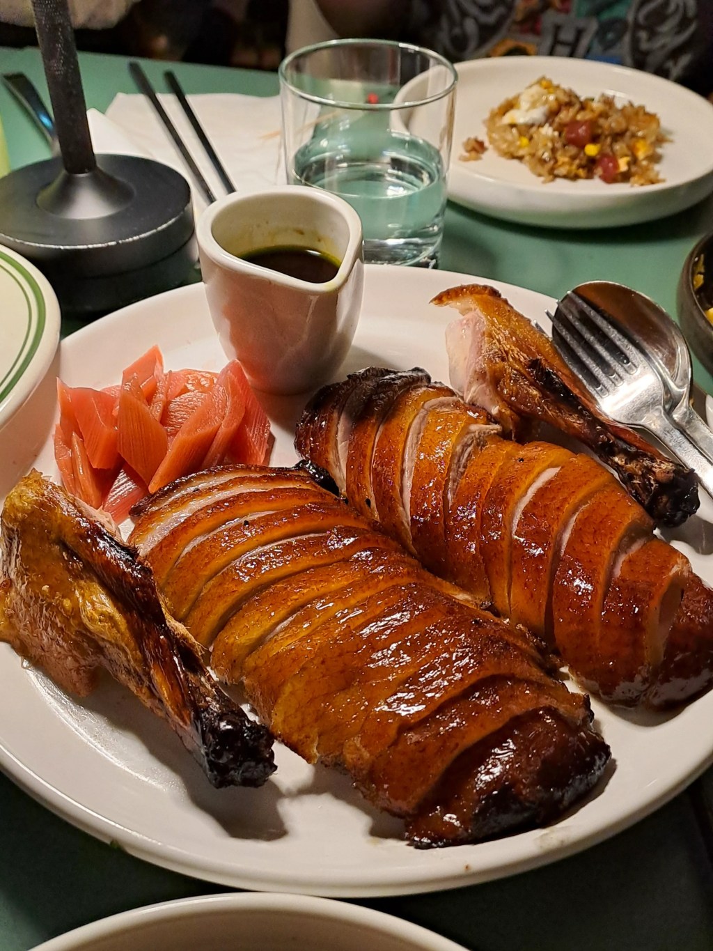 Glossy glazed roast meat with pickles at Yum Sing House